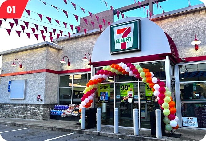 7-Eleven grand opening storefront with balloon arch