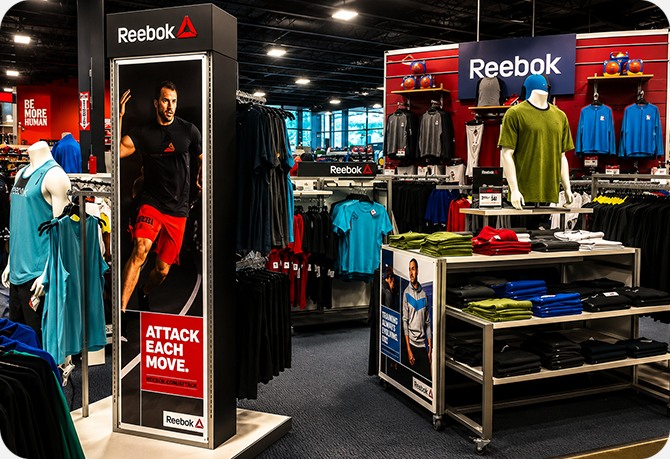 Reebok apparel display inside a Dick's Sporting Goods store